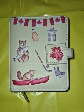 NWOT Unisex SHAGWEAR Cream Canada-Themed Zip Wallet with Red Accents..